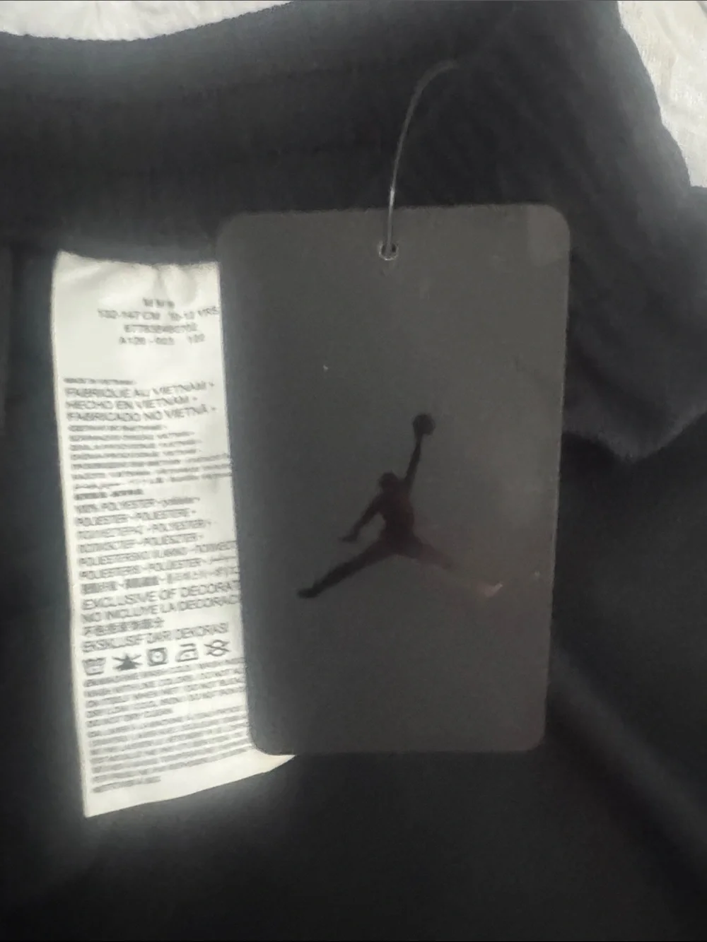 Nike Black Athletic Mesh Shorts with White and Red Logo